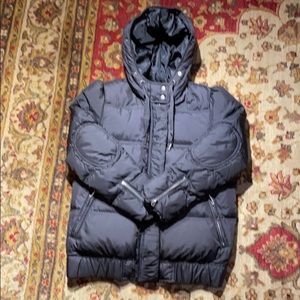 Juicy Black hooded Coat with many details.